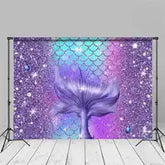 Mermaid tail backdrop with purple and teal scales, glittery texture